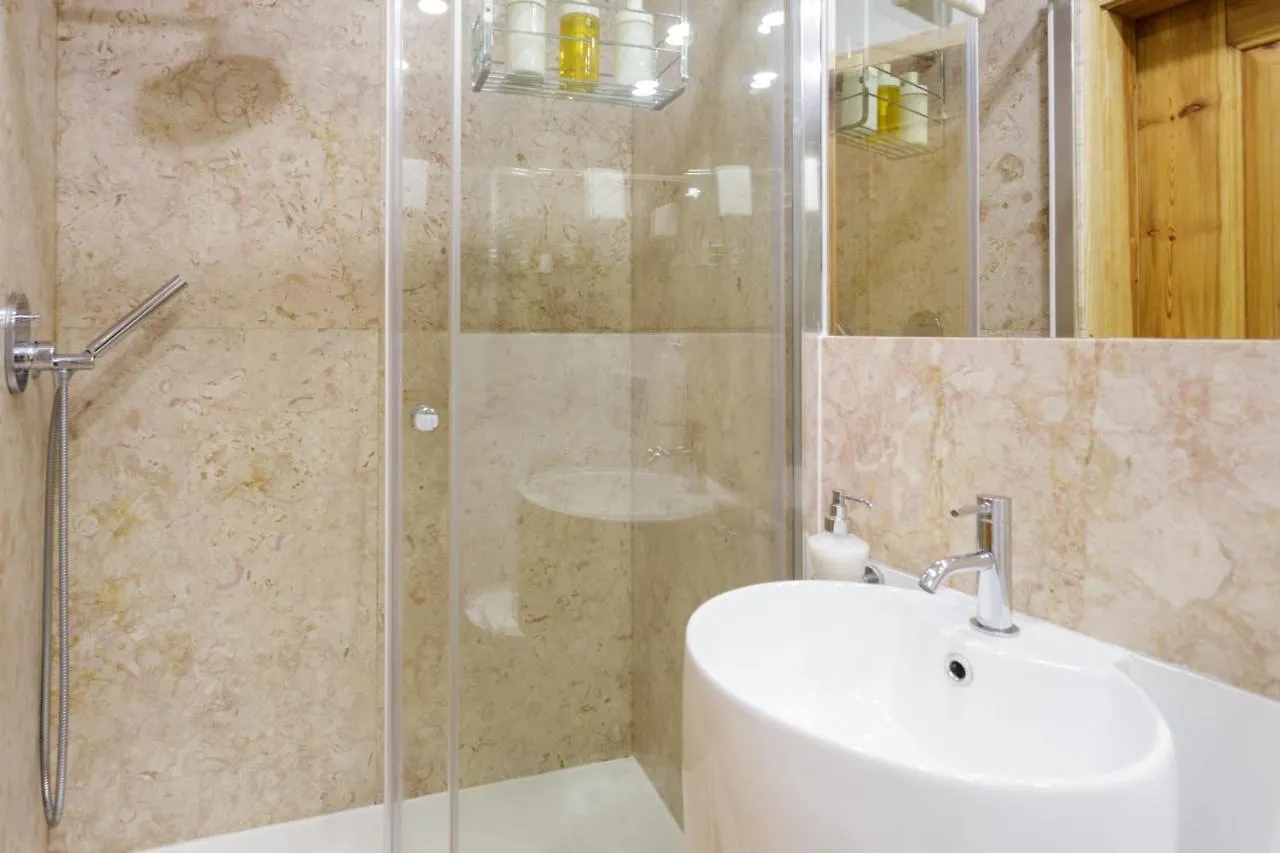Chiado Rooftop Retreat: 19th Century Charm with River Views Lisbon