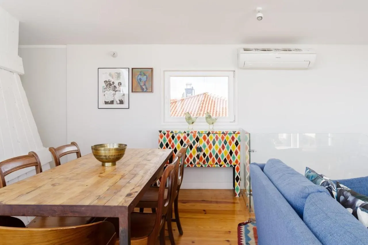 Chiado Rooftop Retreat: 19th Century Charm with River Views Lisbon Apartment