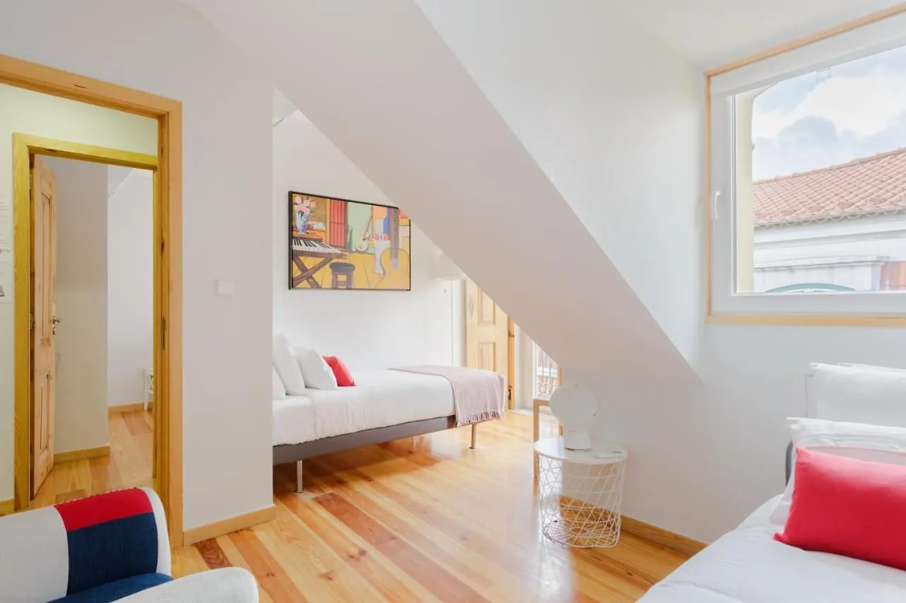 Chiado Rooftop Retreat: 19th Century Charm with River Views Lisbon