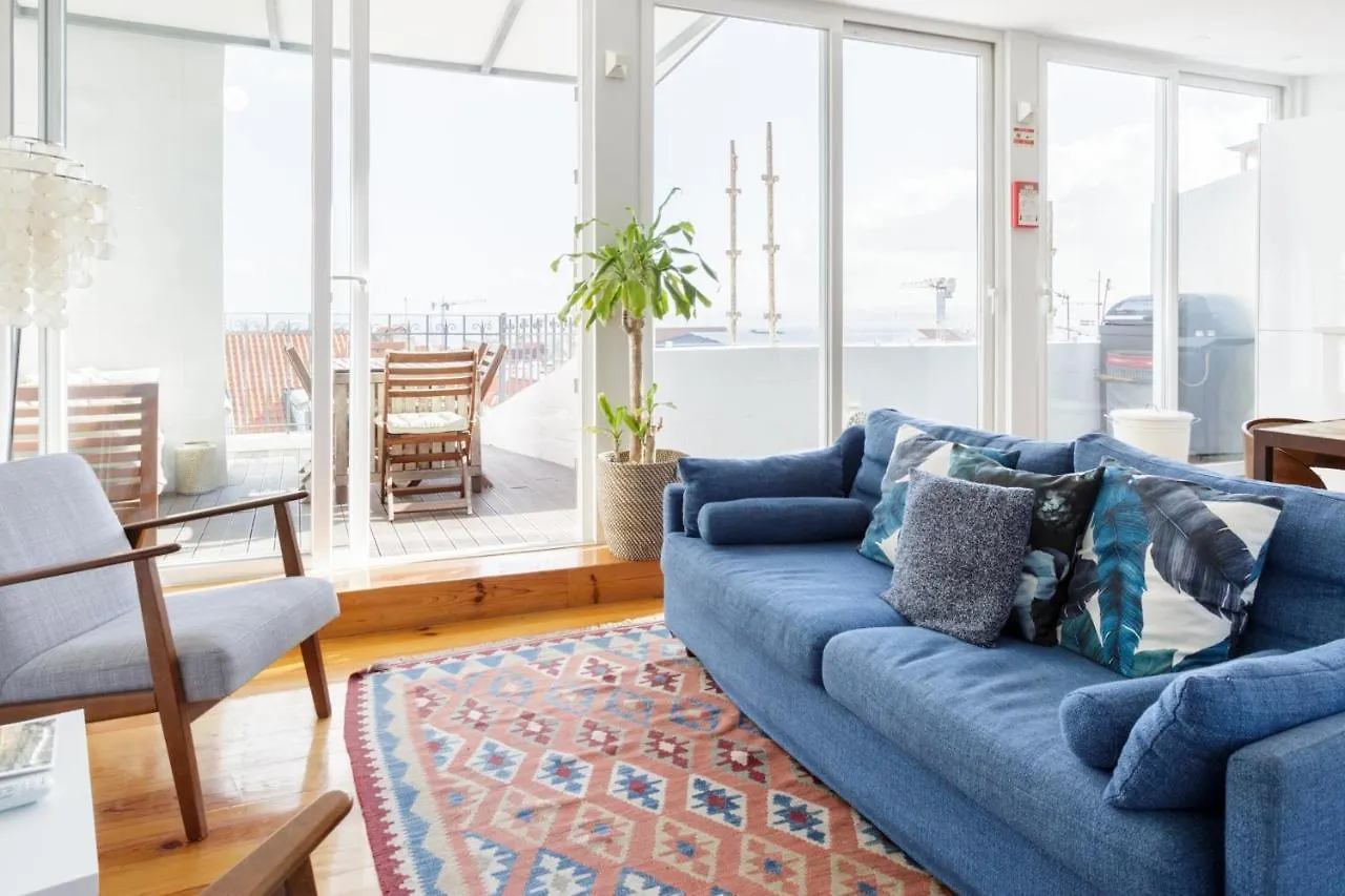 Chiado Rooftop Retreat: 19th Century Charm with River Views Lisbon Apartment
