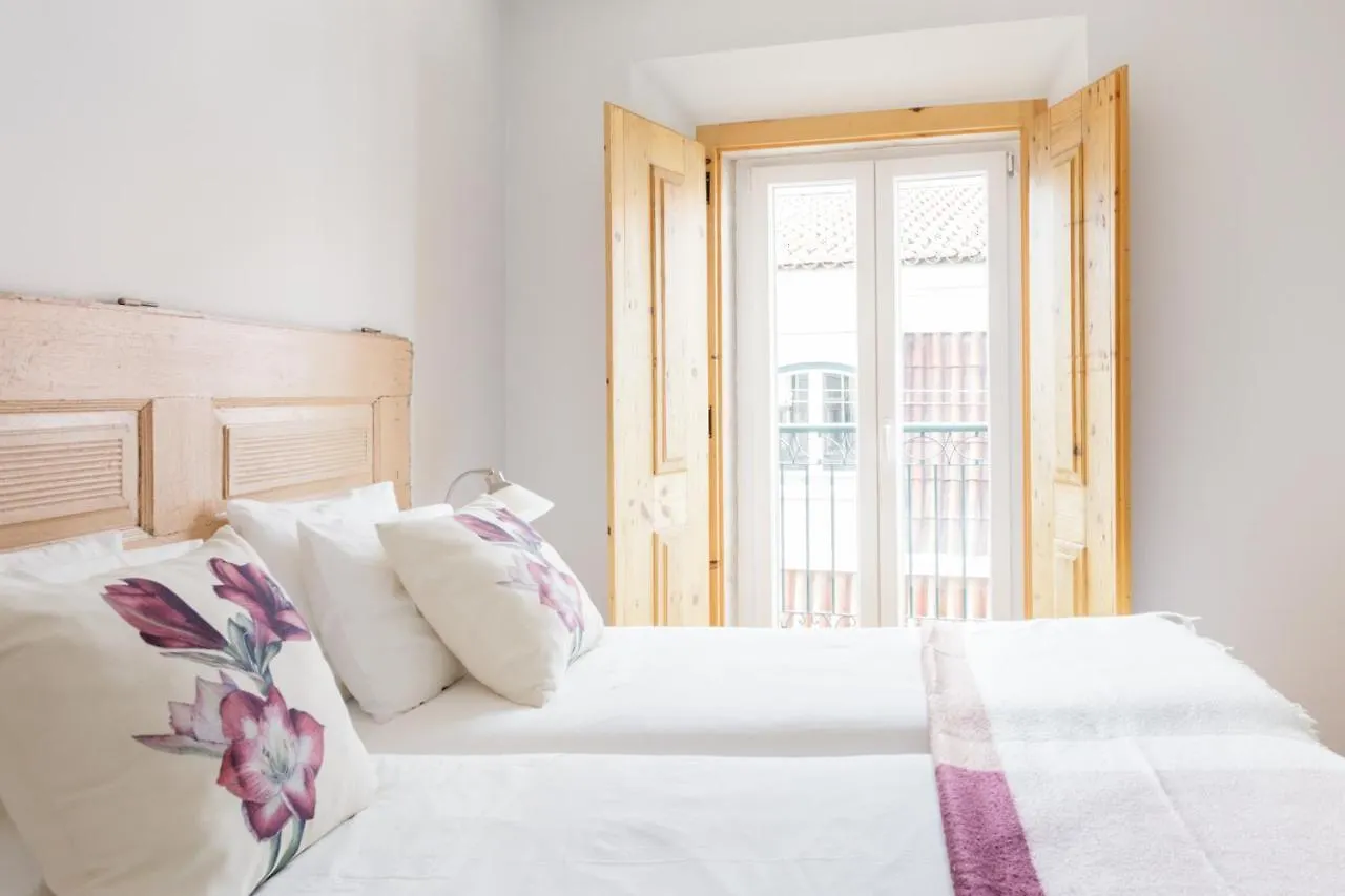Chiado Rooftop Retreat: 19th Century Charm with River Views Lisbon