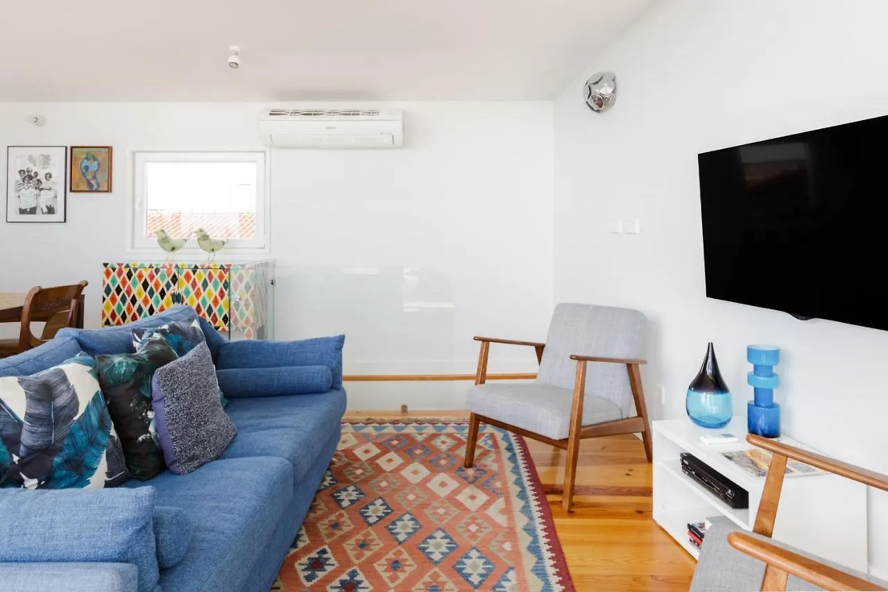 Chiado Rooftop Retreat: 19th Century Charm with River Views Lisbon Apartment