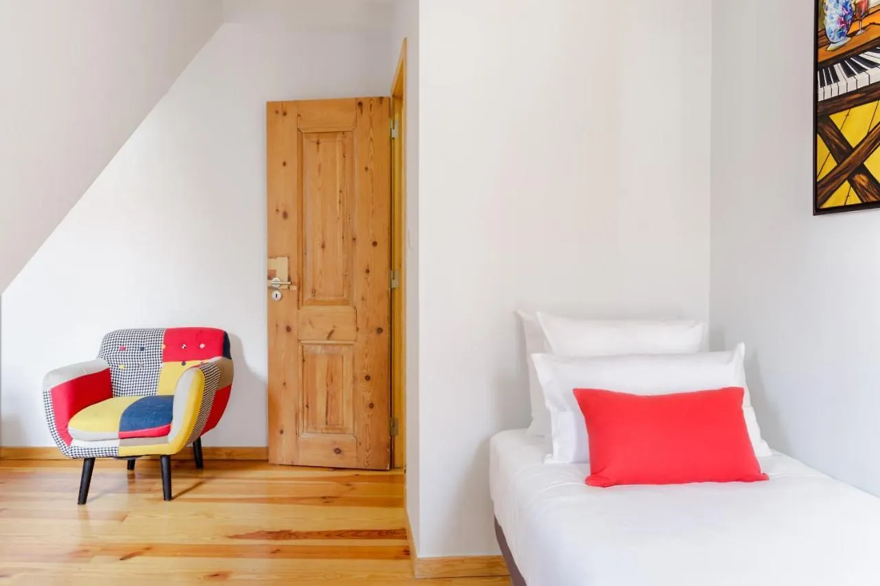 Chiado Rooftop Retreat: 19th Century Charm with River Views Lisbon