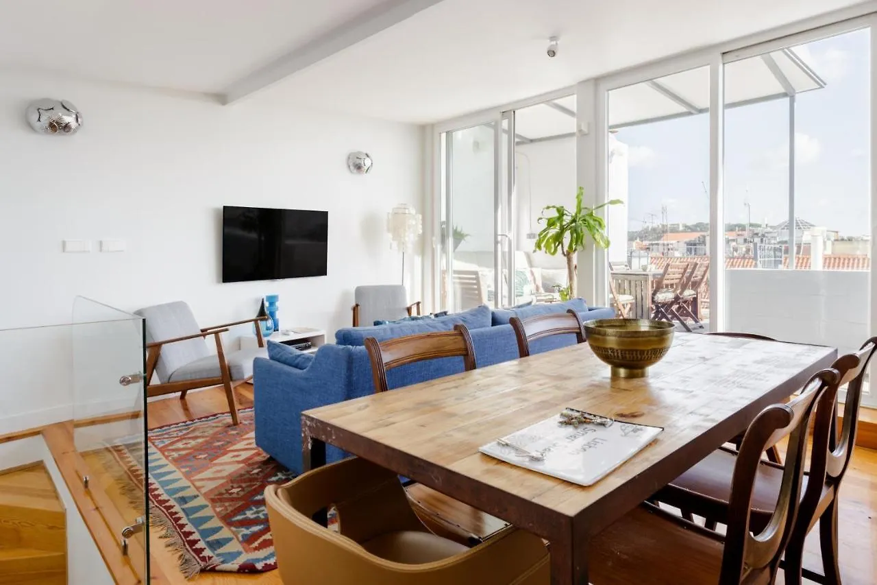 Chiado Rooftop Retreat: 19th Century Charm with River Views Lisbon