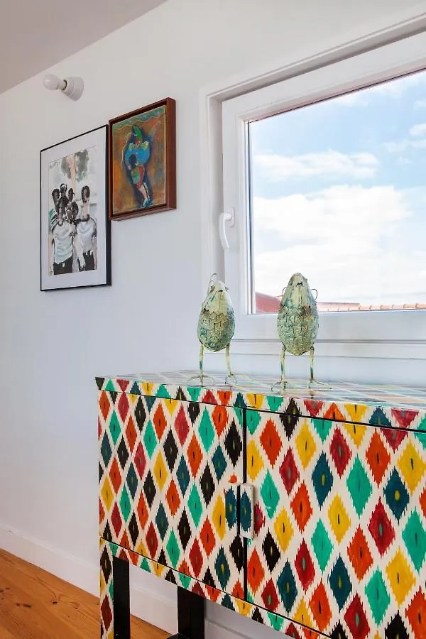 Chiado Rooftop Retreat: 19th Century Charm with River Views Lisbon