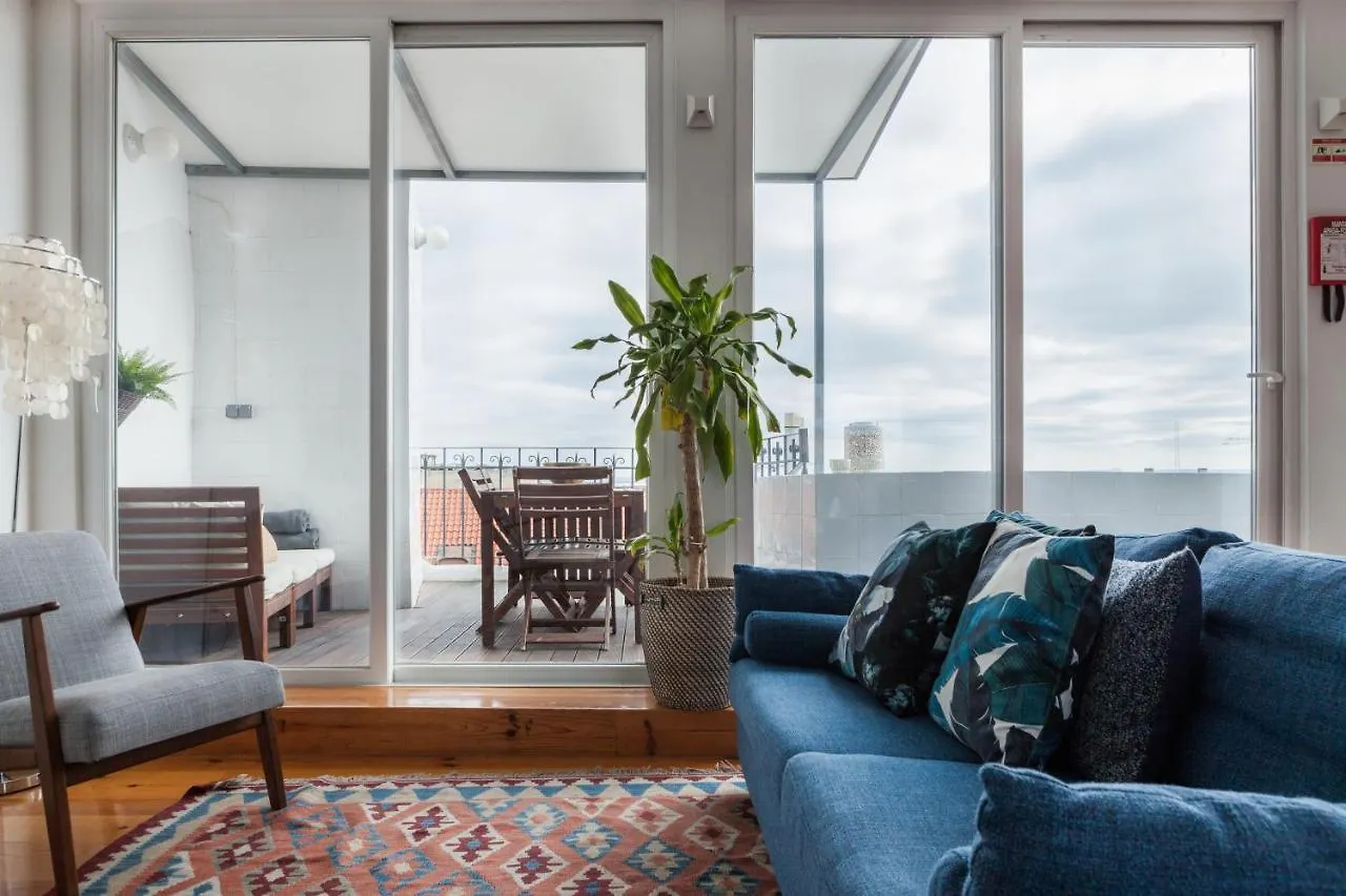 Chiado Rooftop Retreat: 19th Century Charm with River Views Lisbon