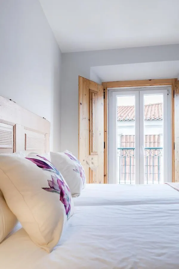Chiado Rooftop Retreat: 19th Century Charm with River Views Lisbon Apartment