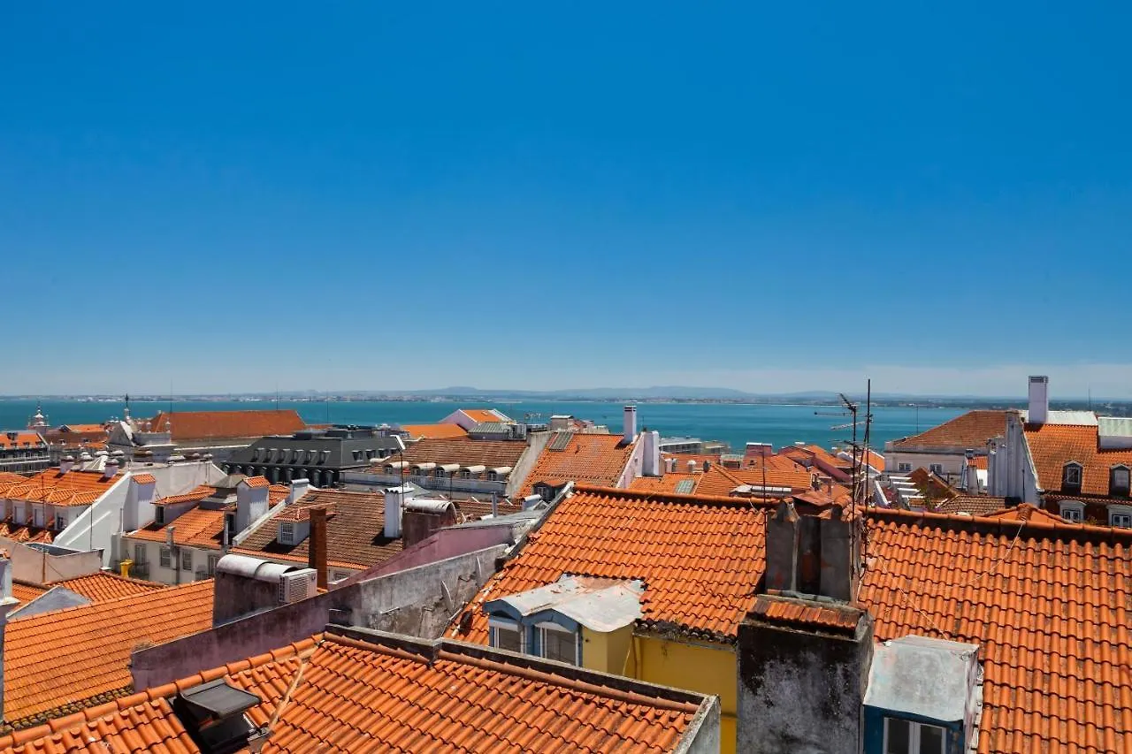 Chiado Rooftop Retreat: 19th Century Charm with River Views Lisbon Apartment