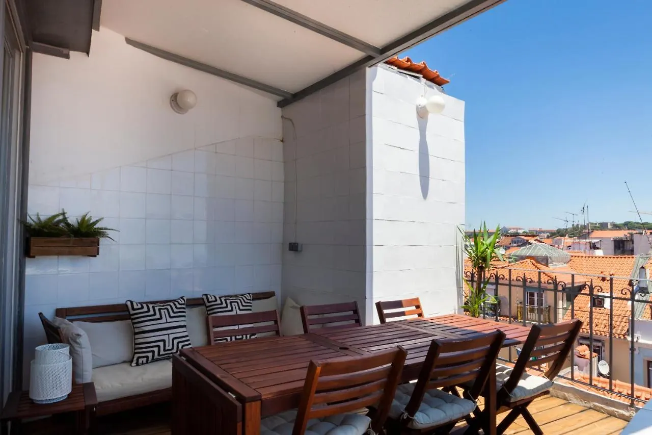 Chiado Rooftop Retreat: 19th Century Charm with River Views Lisbon Apartment