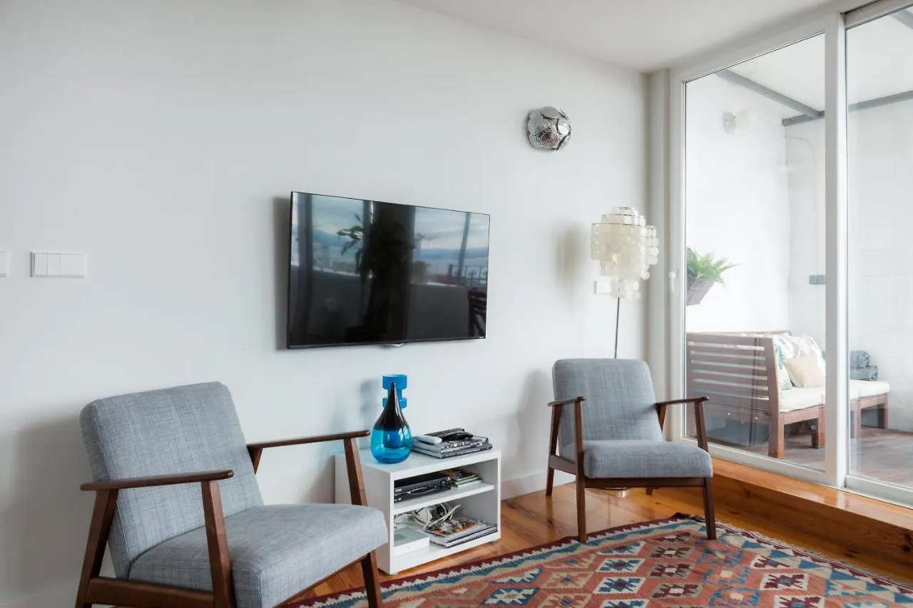 Chiado Rooftop Retreat: 19th Century Charm with River Views Lisbon